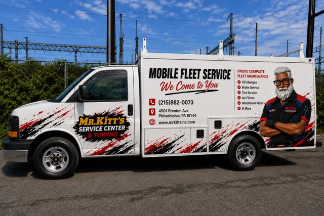 The Mr. Kitt's mobile fleet service van, lettered for onsite fleet maintenance